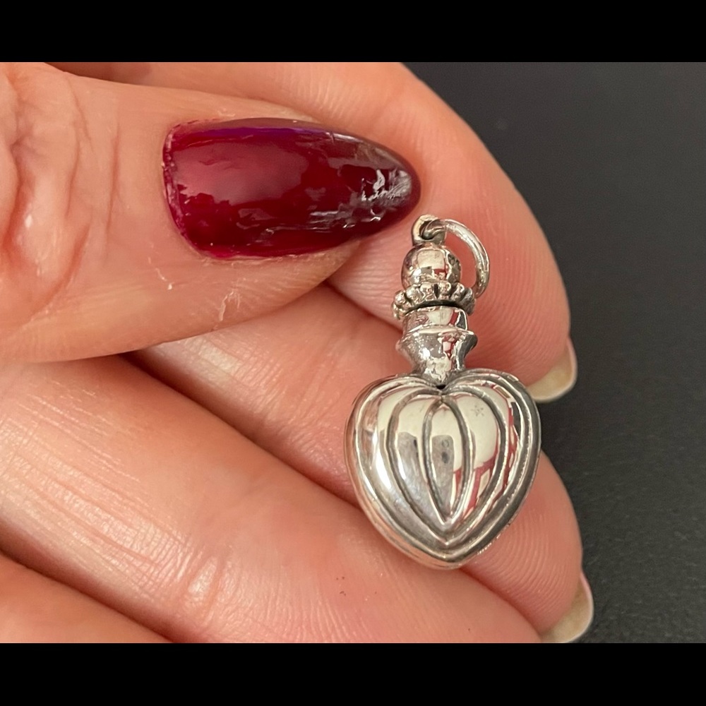Sweet little silver pendent.